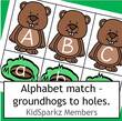 Alphabet match groundhog upper case letters to holes lower case.