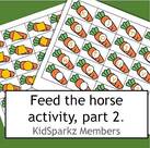 Feed the horse activity, part 2. Children feed carrots to the horse
