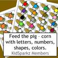 Feed the pig activity part 2. Children feed corn to the pig - numbers, letters, colors, shapes